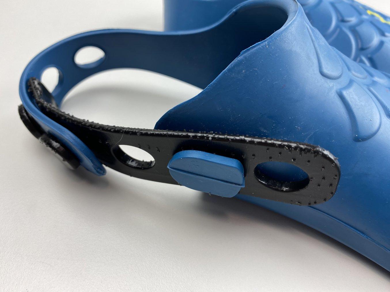 The product development group developed a strap extension to accommodate all sizes.