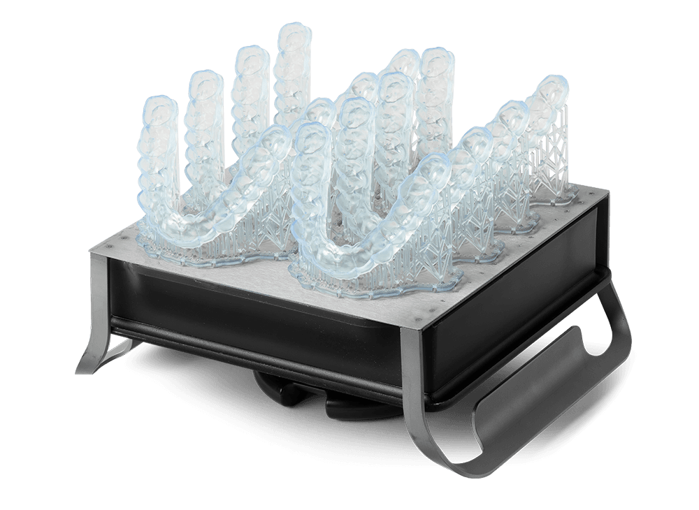 Piattaforma di stampa con alcuni bite occlusali stampati in Dental LT Comfort Resin.