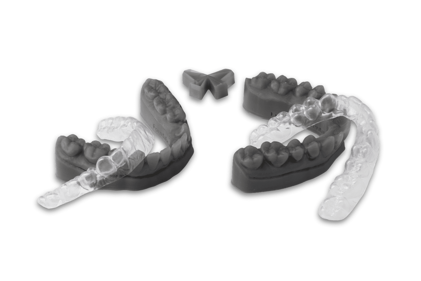 Grey 3D printed dental model and clear aligners