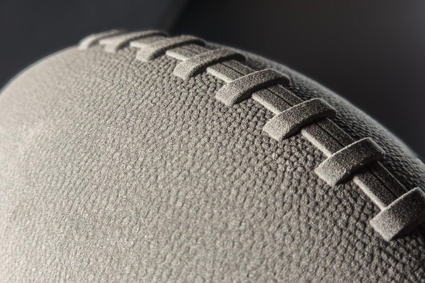Close up on the fine texture of a 3D printed American football