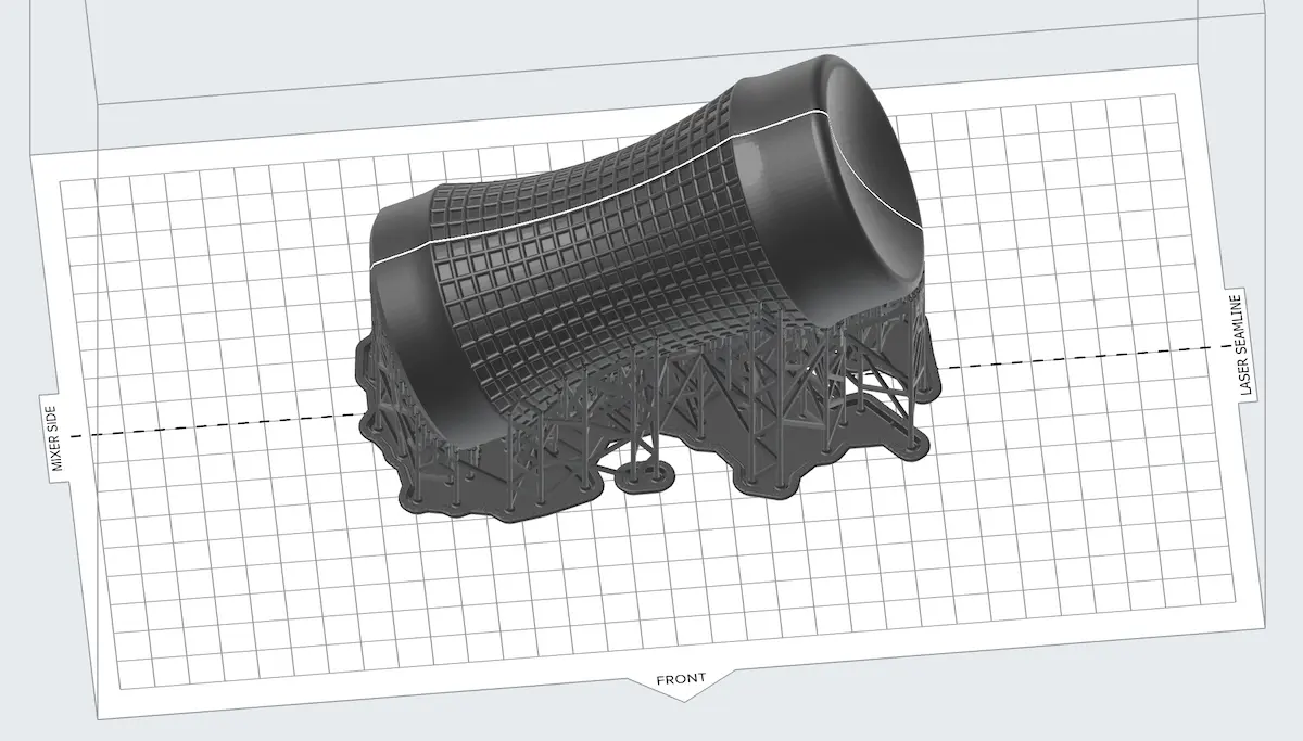 A screenshot of a model placed at the middle of a Form 3L build platform in PreForm. The seamline is visualized in PreForm as a solid line on any part that crosses the centerline of the build platform.