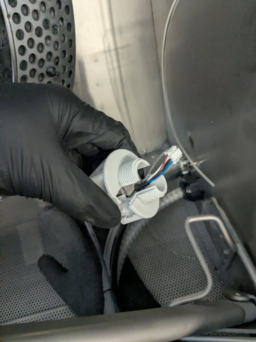 Step 2: Secure the ionizer cable in the clamp