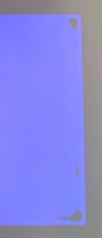 Small dark spots near the edge of a Form 4 LPU