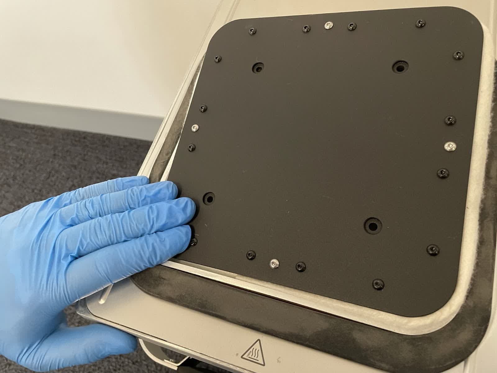 Pressing the print bed into place