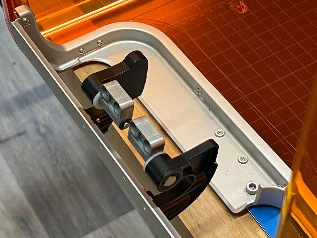 Cover hinges on a Form 4 generation printer