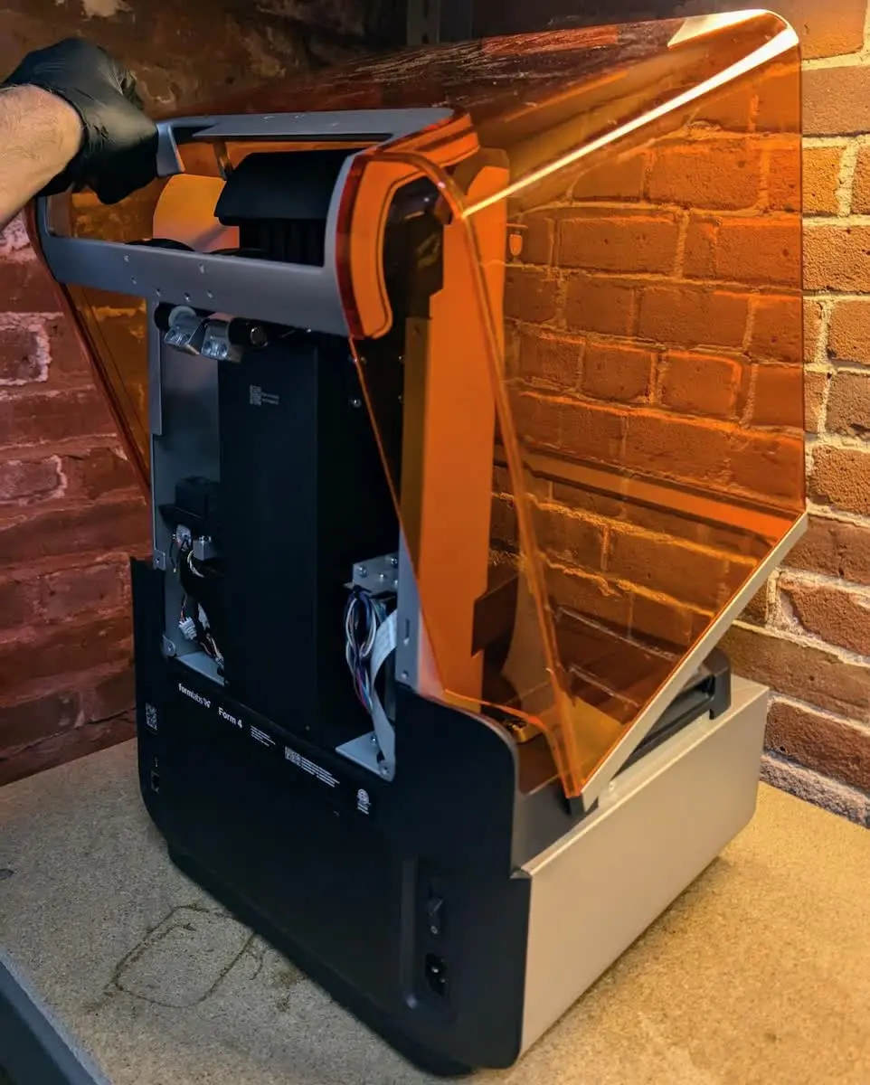 Rotating the Form 4 cover to remove it step 1