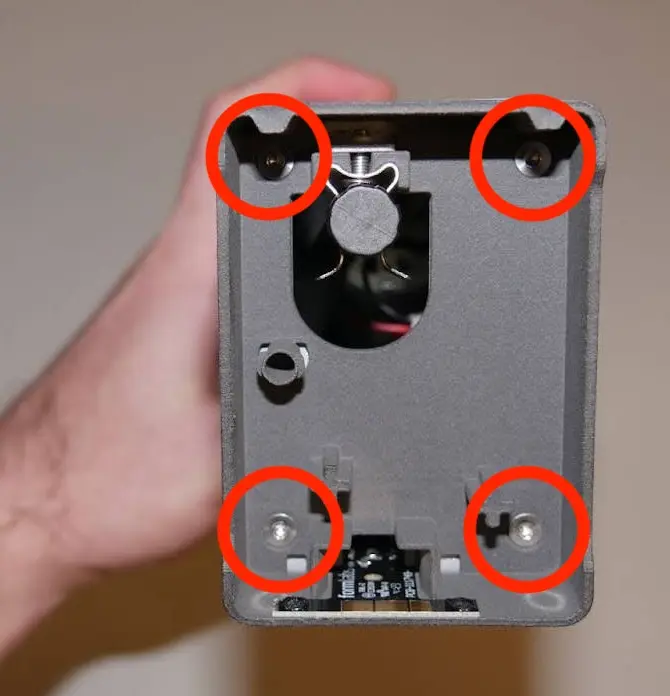 Step 2: Unscrew the pump skirt mounting screws