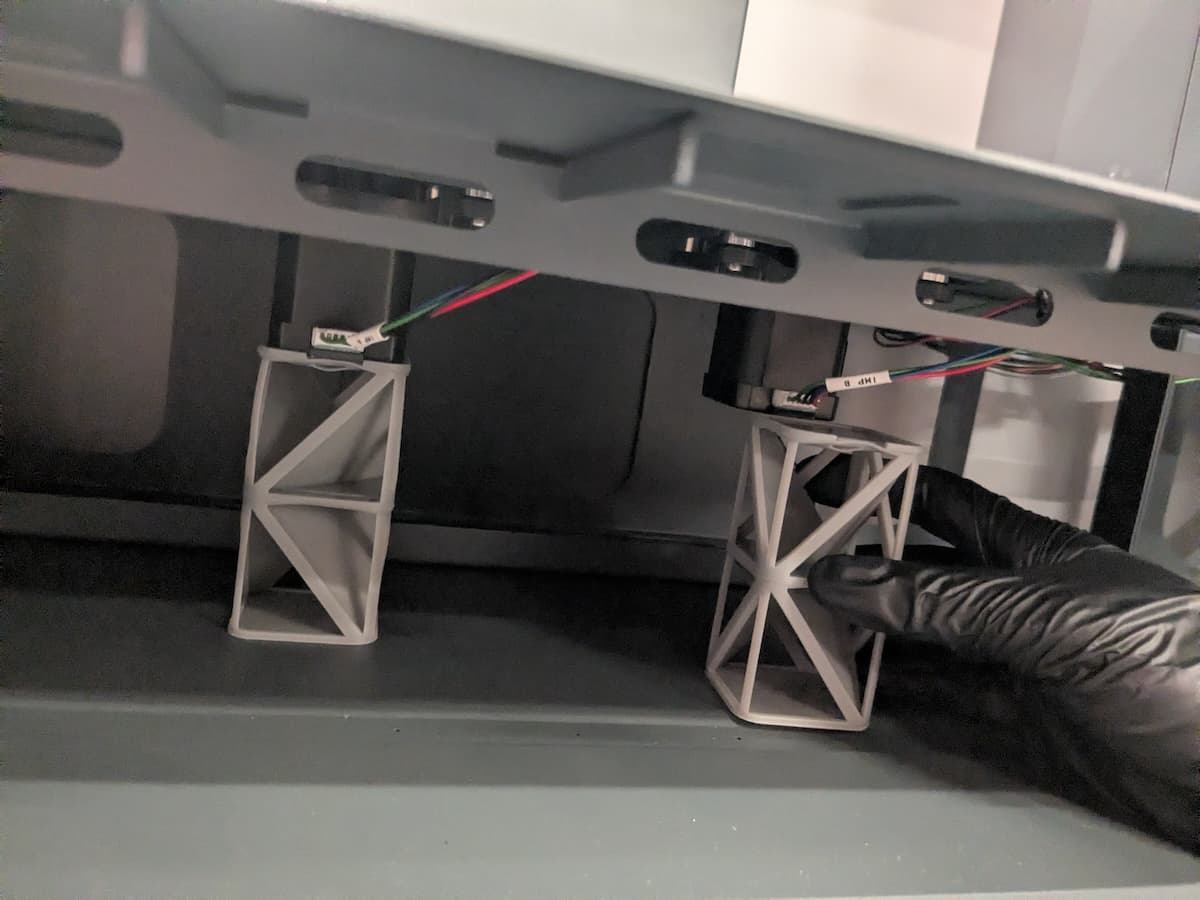 Installing the Form Wash L V2 impeller motor shims