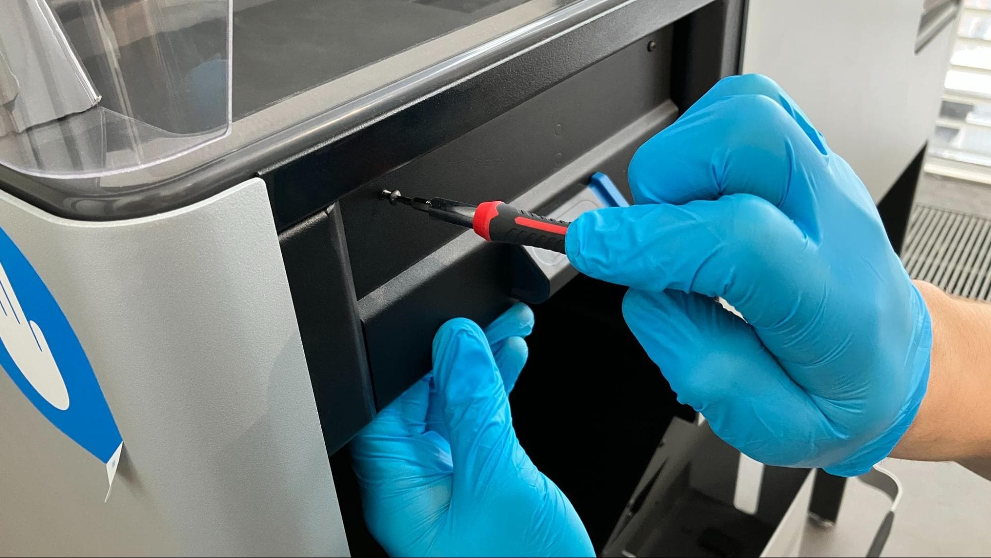 Install the new build chamber latch assembly