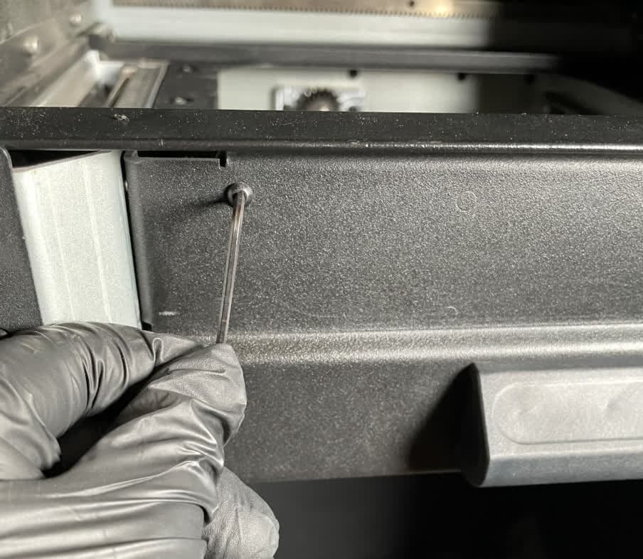 Install the new build chamber latch assembly