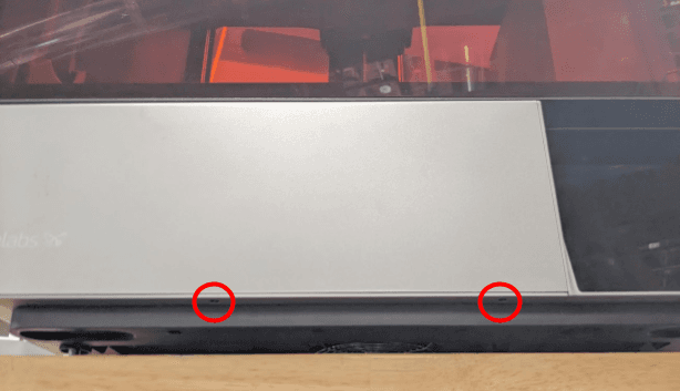 Remove the bottom front panel screws
