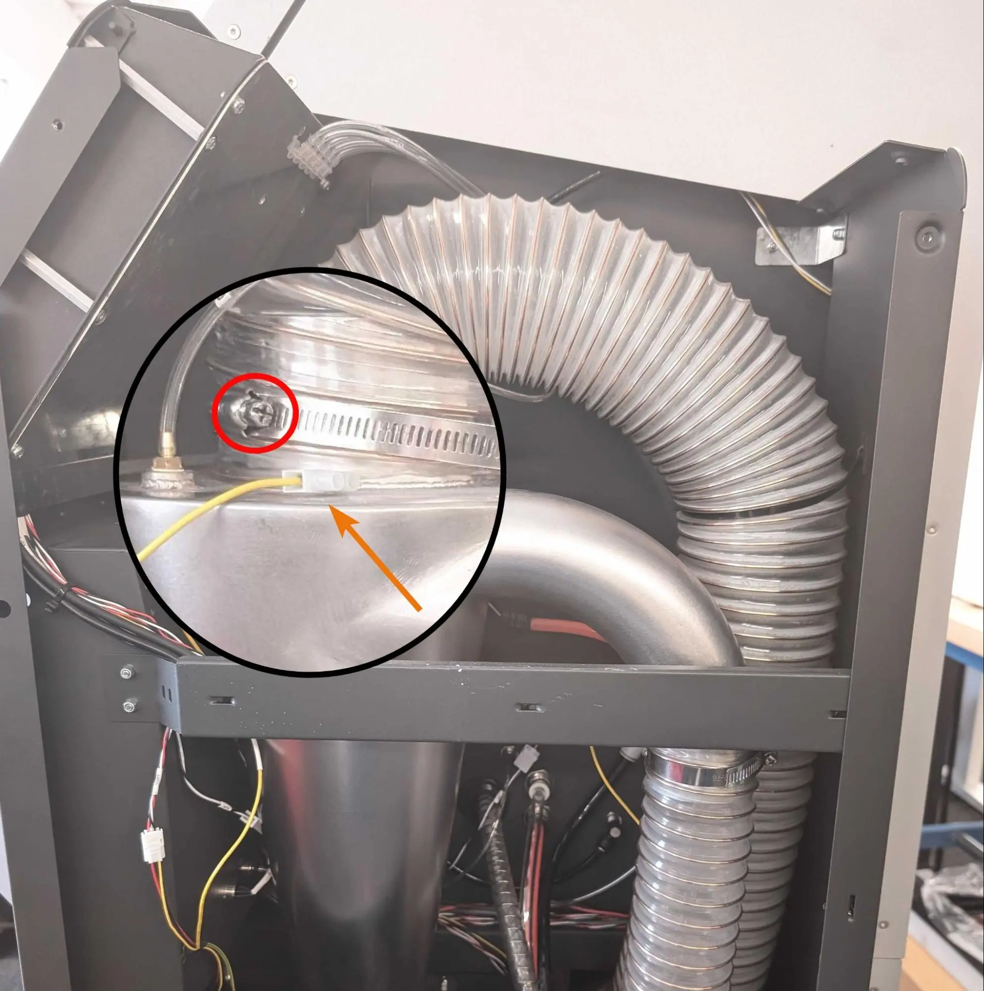 Step 1: Reconnect the outlet hose to the cyclone separator