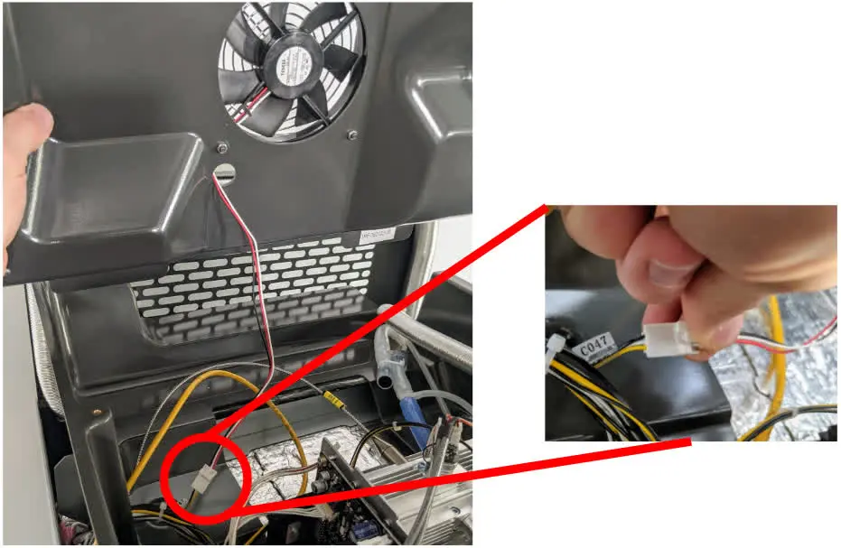 Step 10: Disconnect the fan cable from the upper cooling shroud