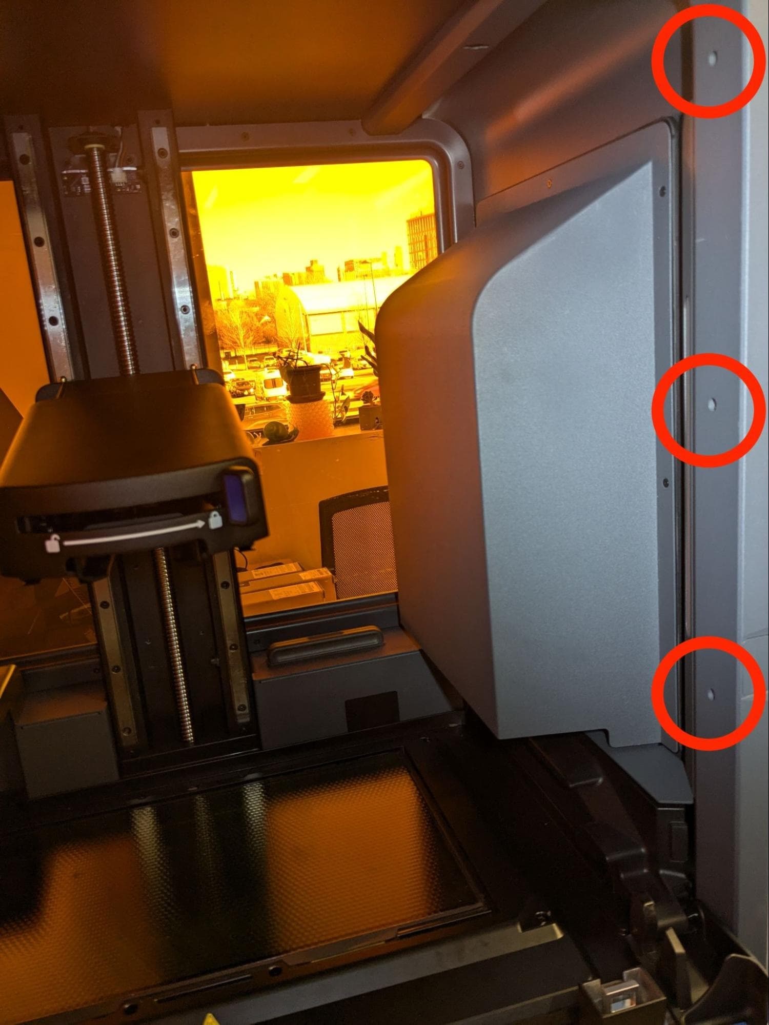 Remove the upper right panel screws