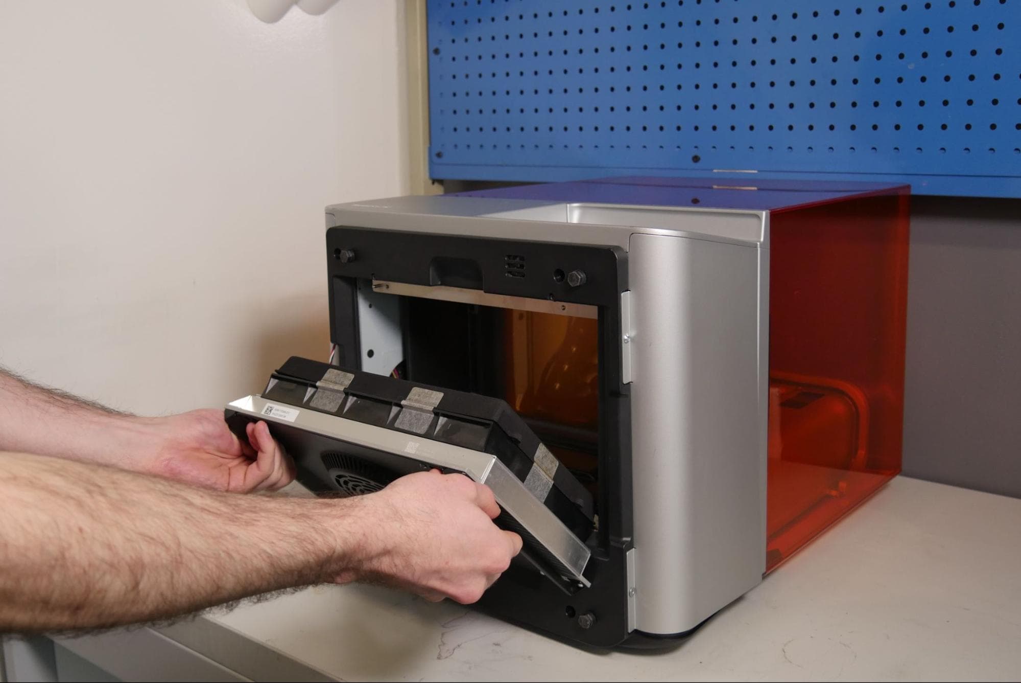 Pulling the Form 4 Backlight Unit away from the printer
