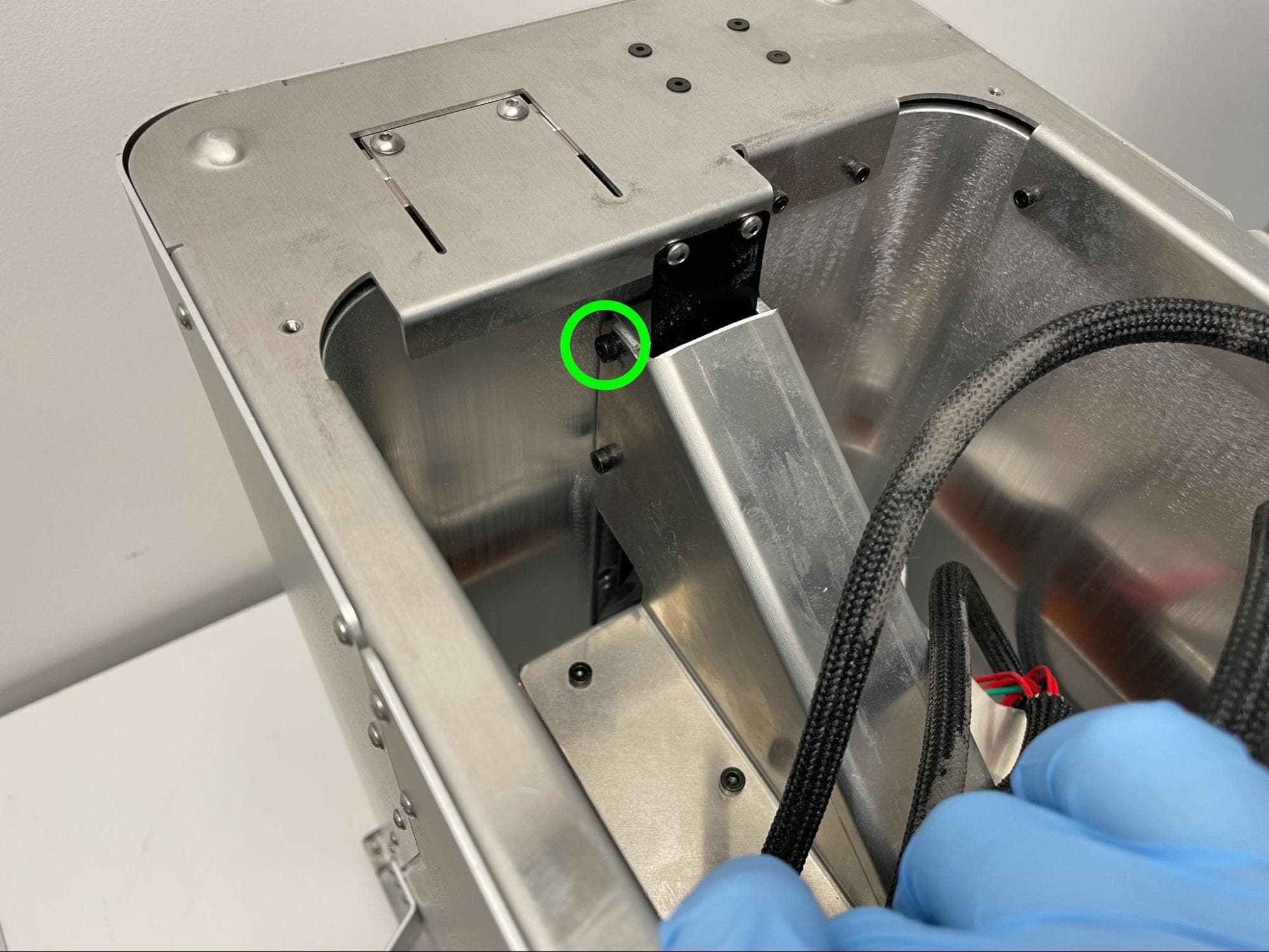 Check the piston arm bracket screws