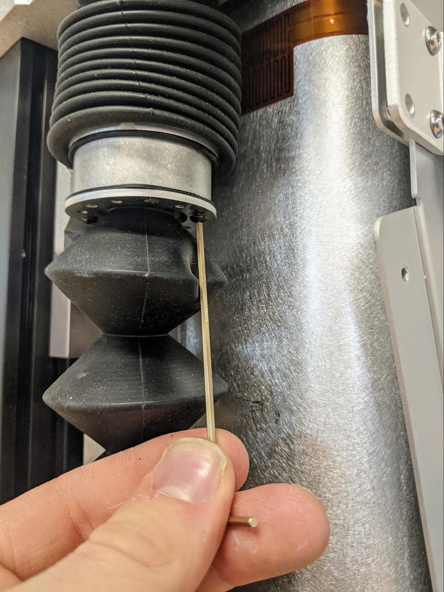 Step 1: Remove the lower rubber lead screw baffle