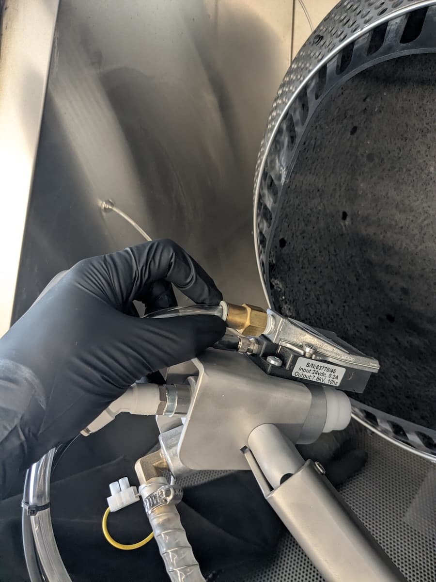 Step 1: Disconnect the part rinse tubing