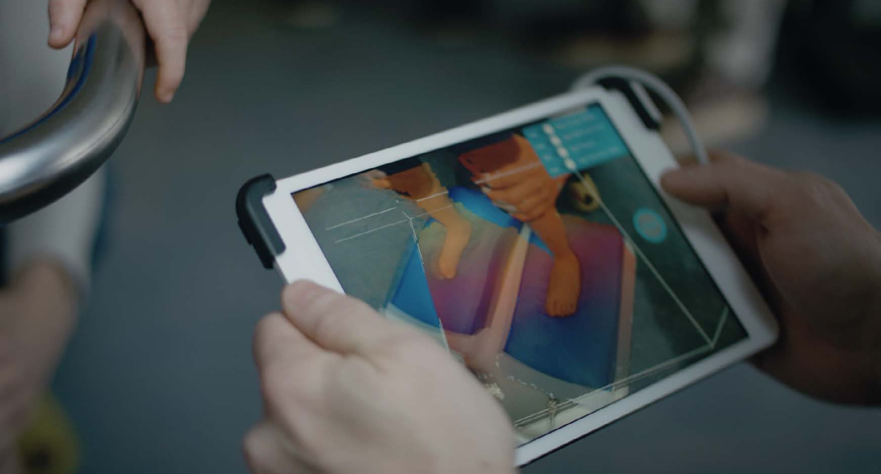 someone holding a tablet