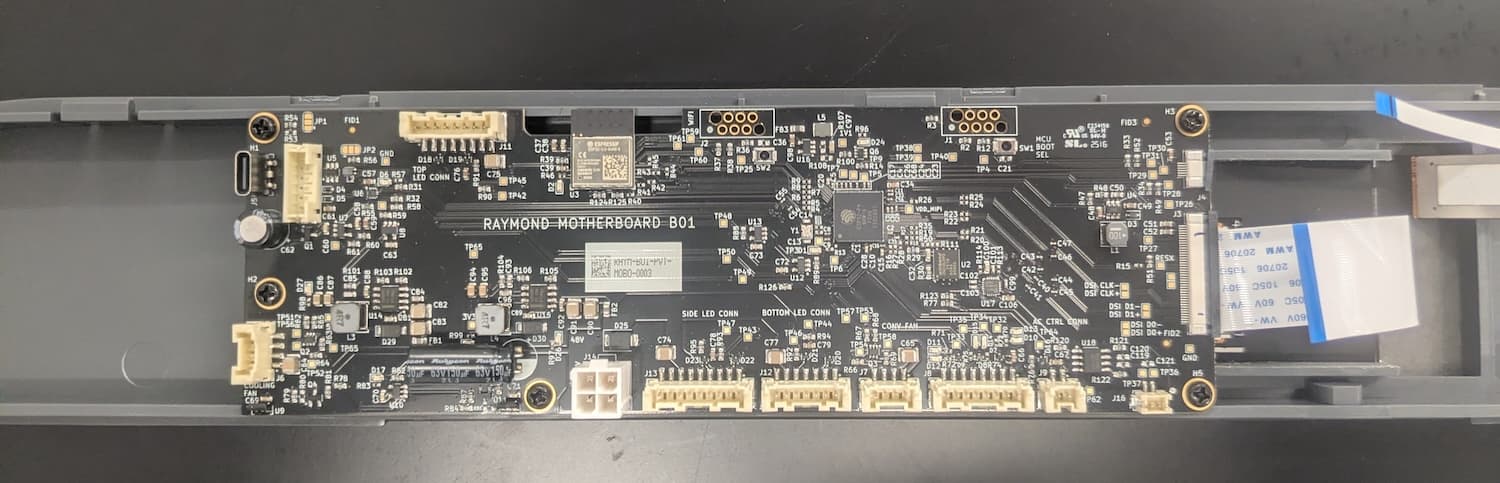 Form Cure L V2 motherboard and display assembly with ribbon cables disconnected
