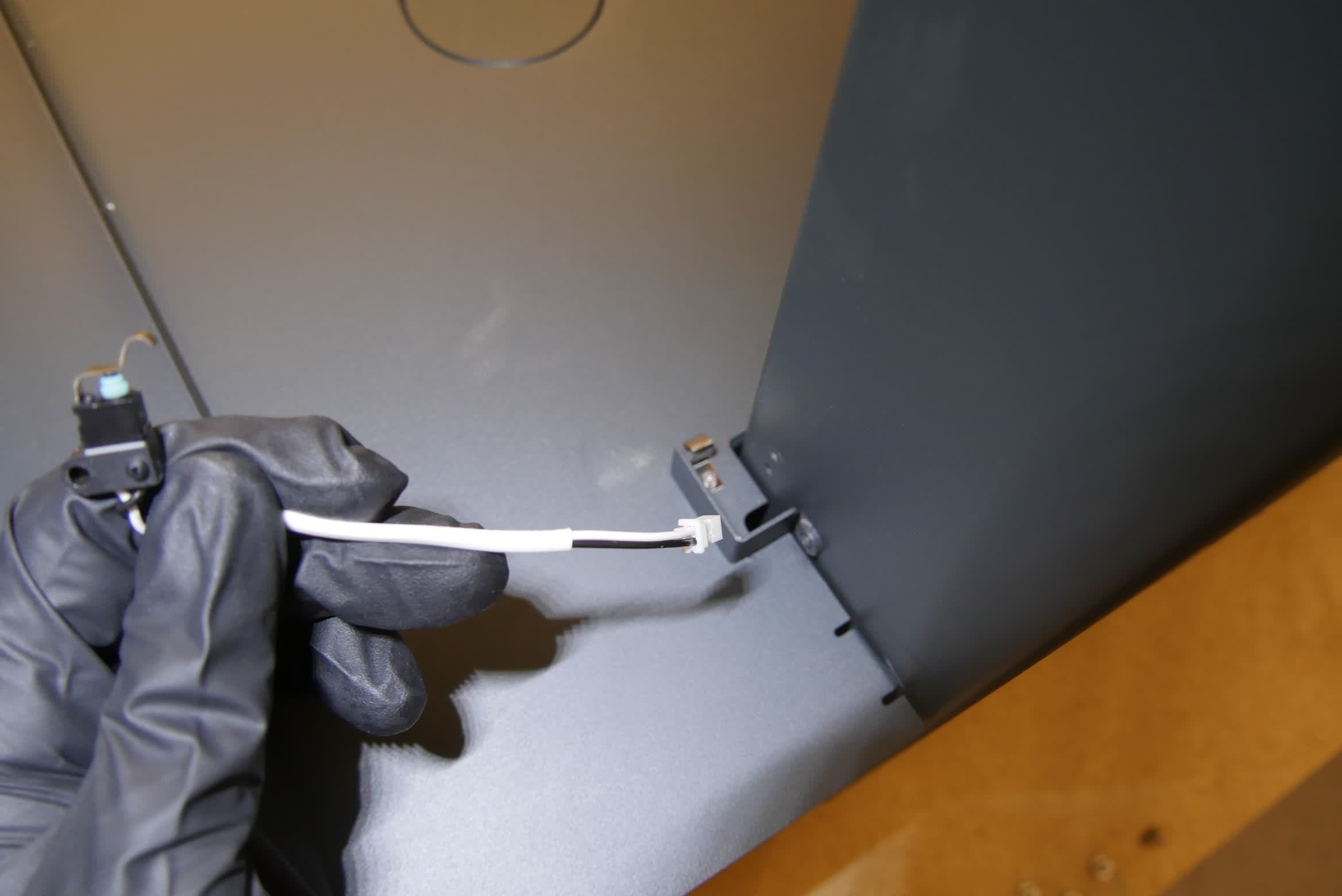 Removing the wash bucket interlock switch from the Form Wash L
