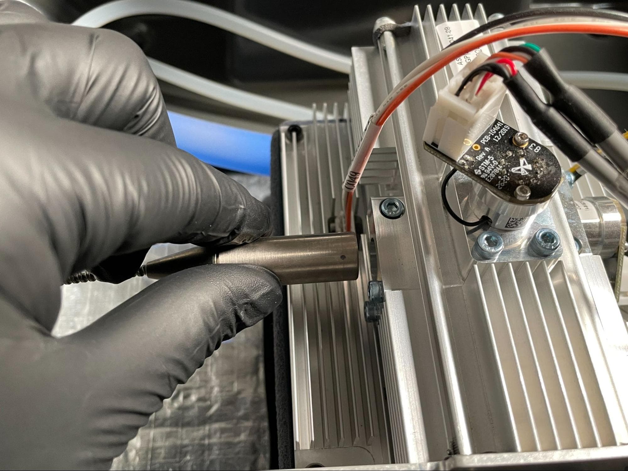 Install the new laser assembly