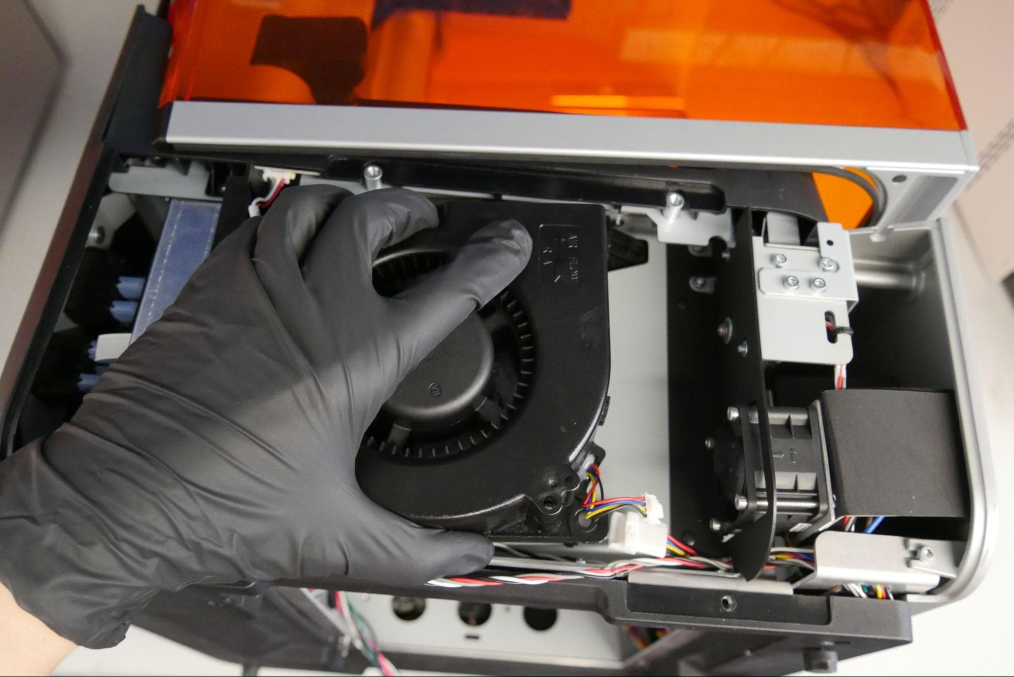 Placing the Form 4 replacement LPU fan in the printer