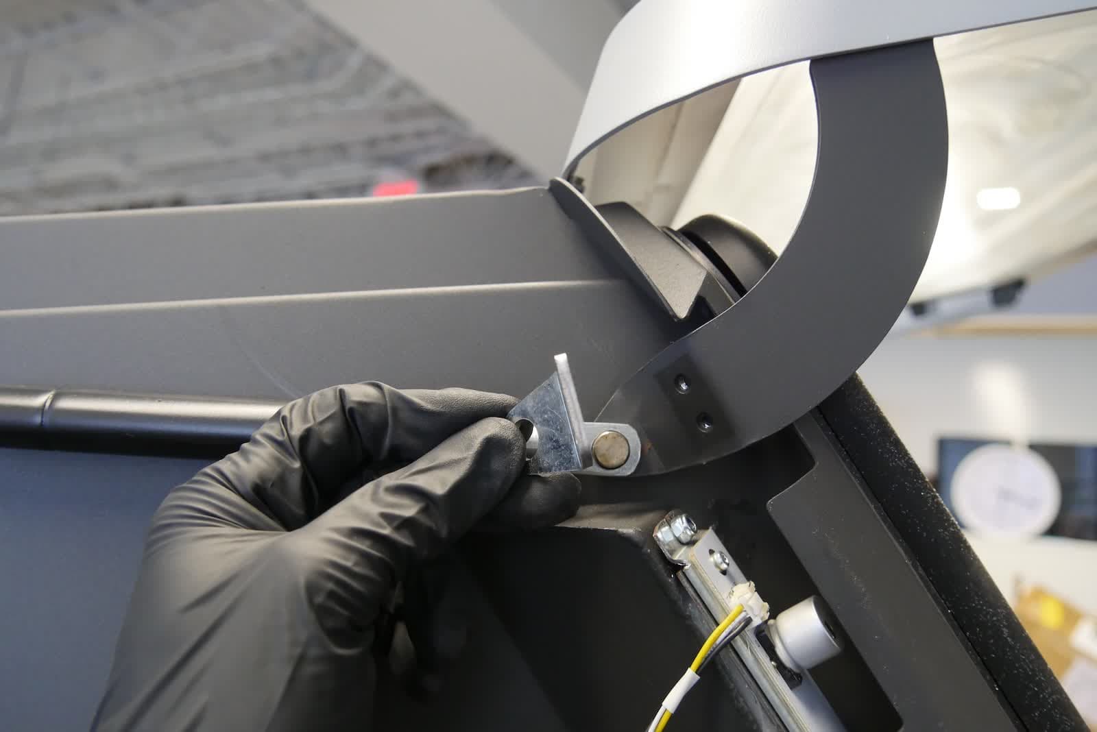 Mounting a bracket over a Fuse Blast gas spring