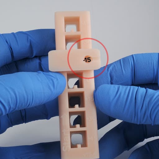 The viewing hole for a perfect fit with the test print is highlighted.