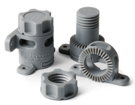 Several models printed in Grey Resin V5 on a Form 4 generation printer