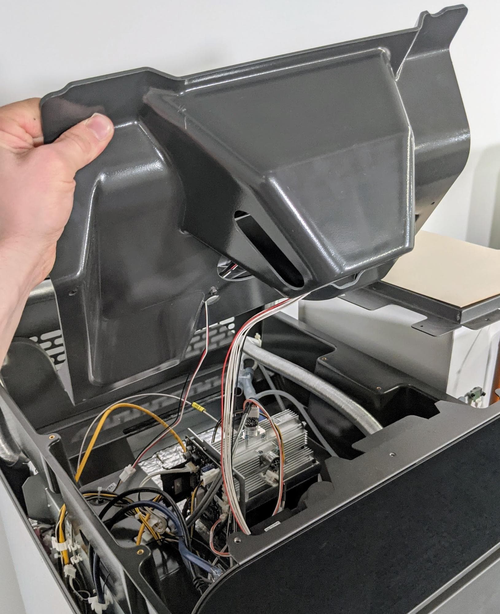 Replace the top cooling shroud