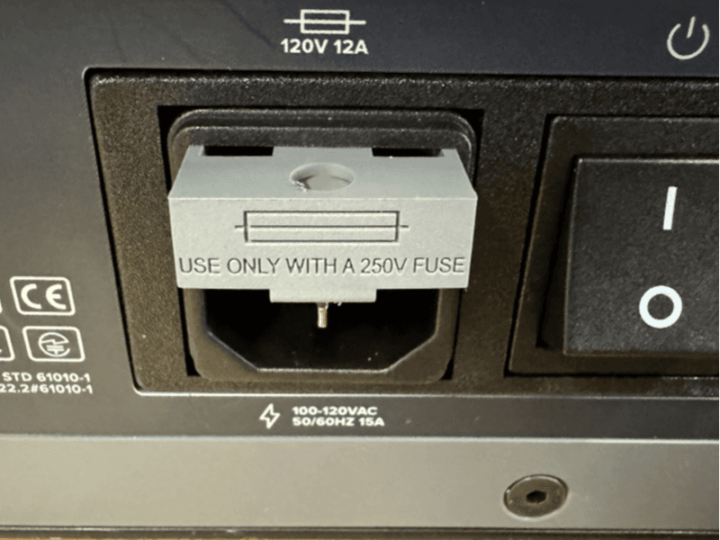 Once there is sufficient leverage, remove the fuse box from the machine.