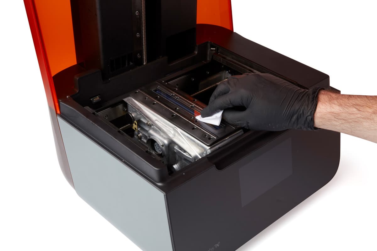 Dry wiping the optical window
