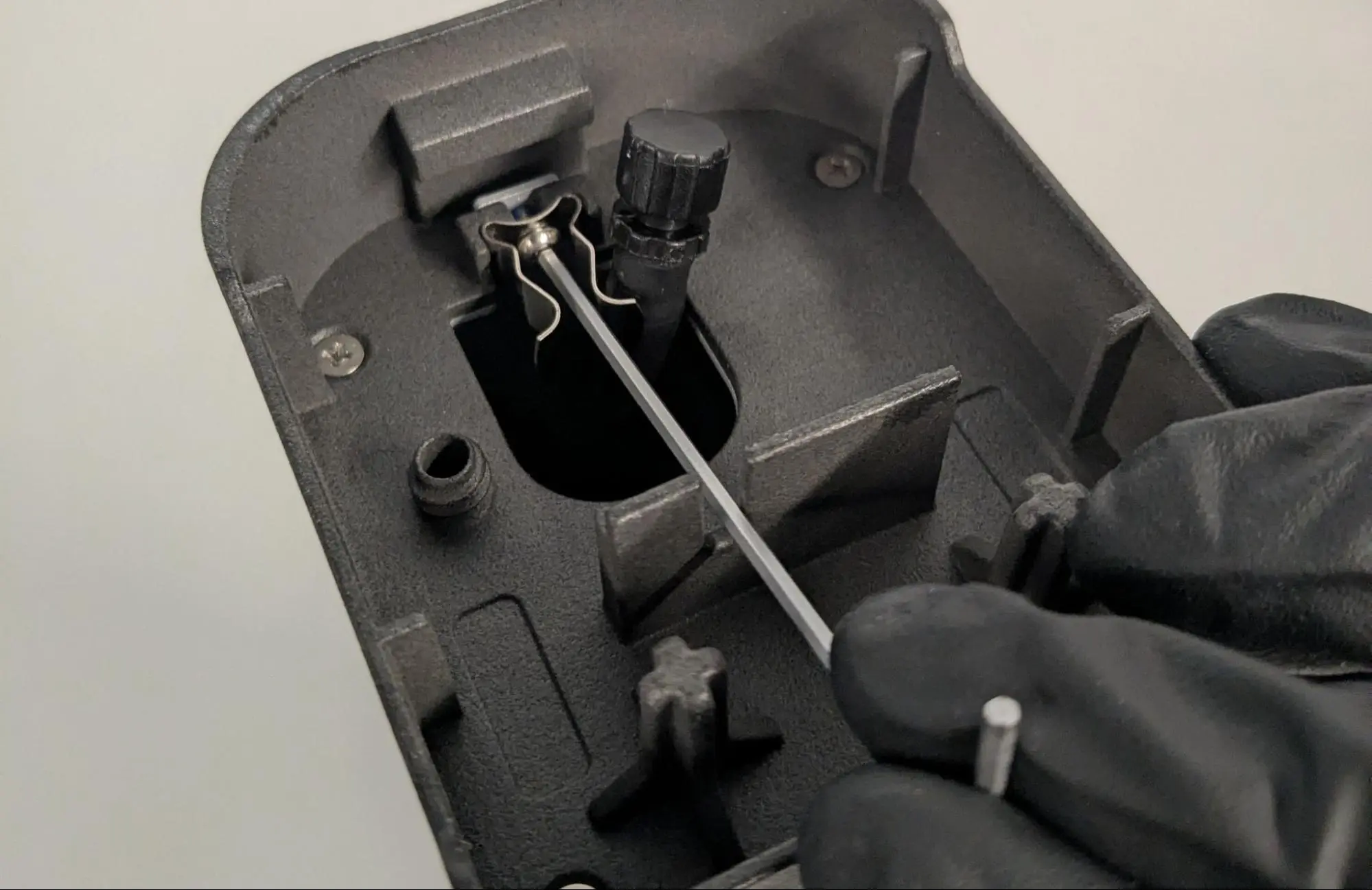 Step 1: Remove the resin pump tube clip