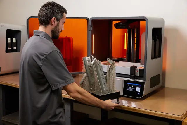 a man takes a part out of Form 4L