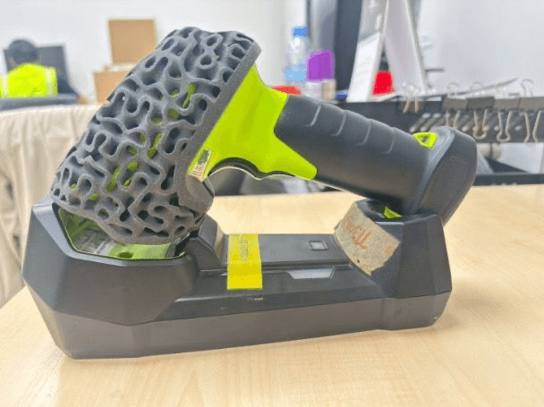 3D printed tool covers in TPU 90A Powder help prevent scratches on car bodies while providing workers with an ergonomic grip.