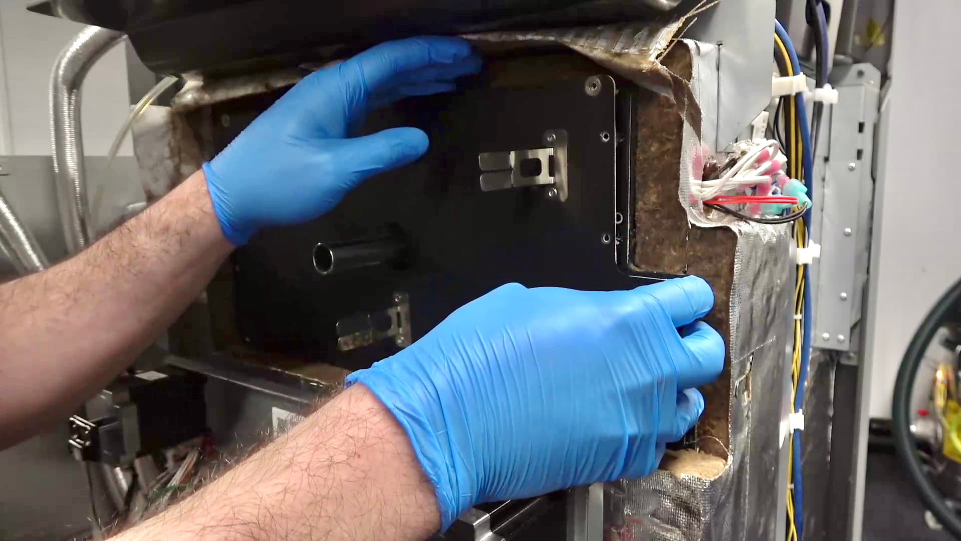 Remove the insulation and inner rear panels