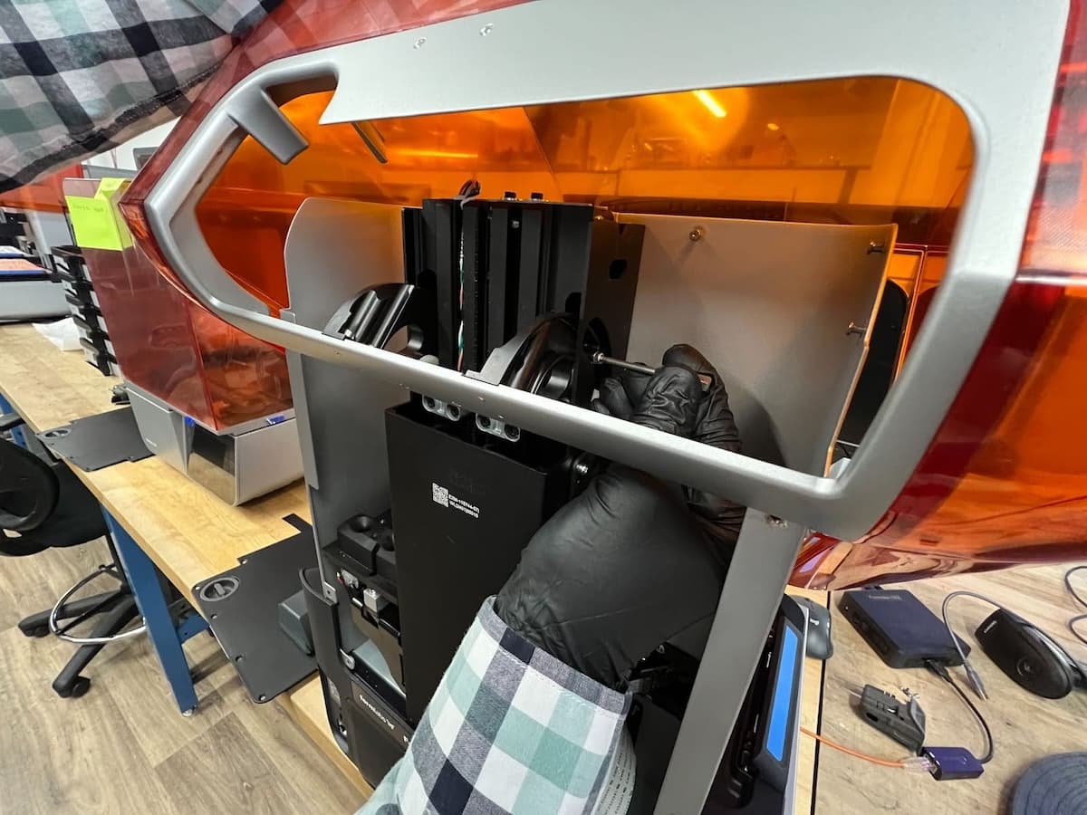 Removing the cover hard stop screw on a Form 4 generation printer