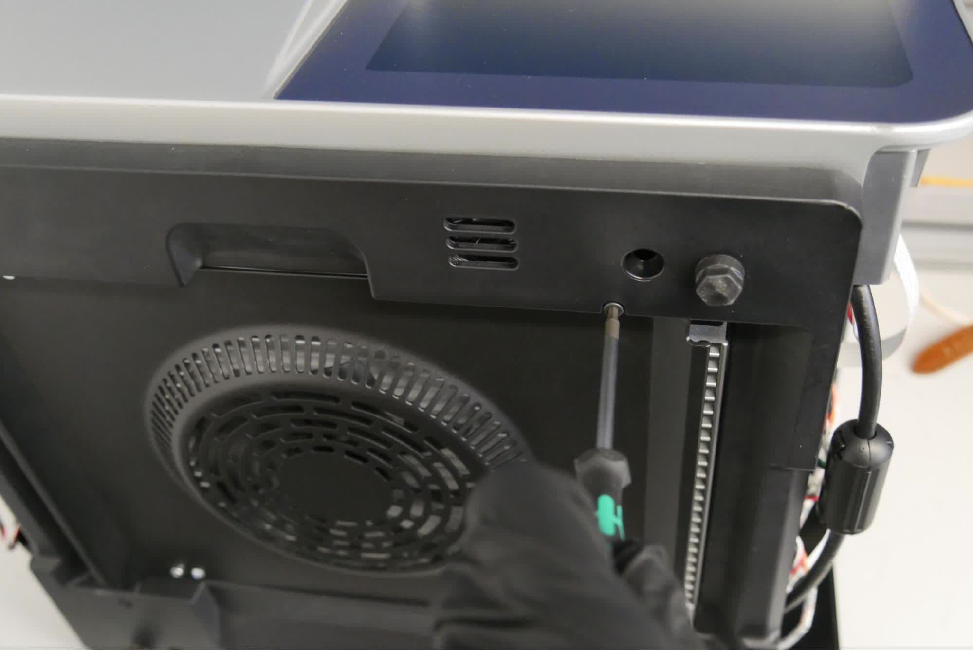 Step 4: Tighten the bottom panel screws