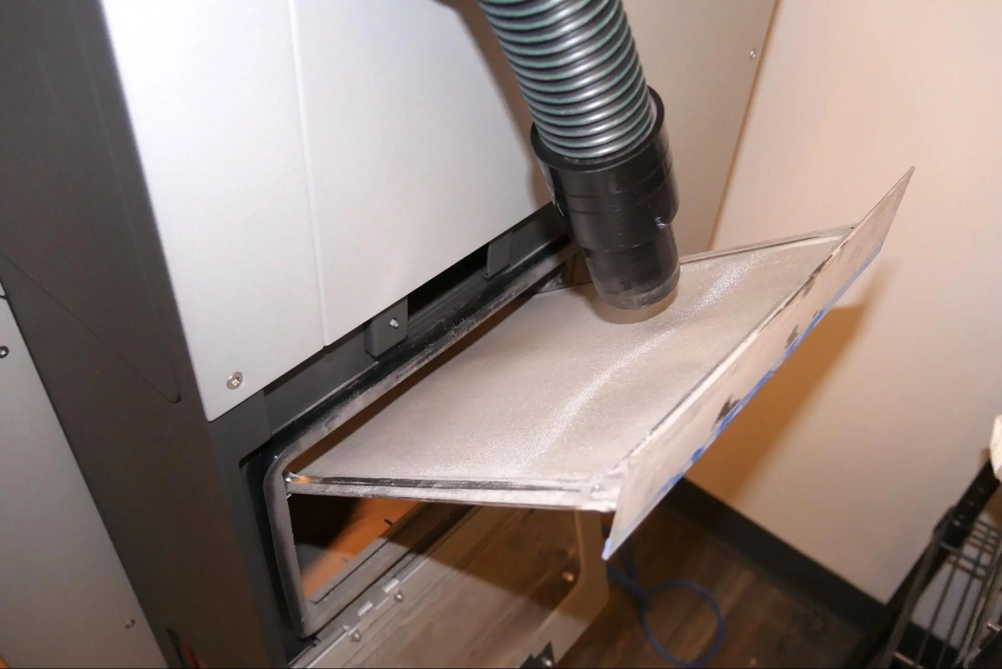 Vacuuming the Fuse Blast media filter