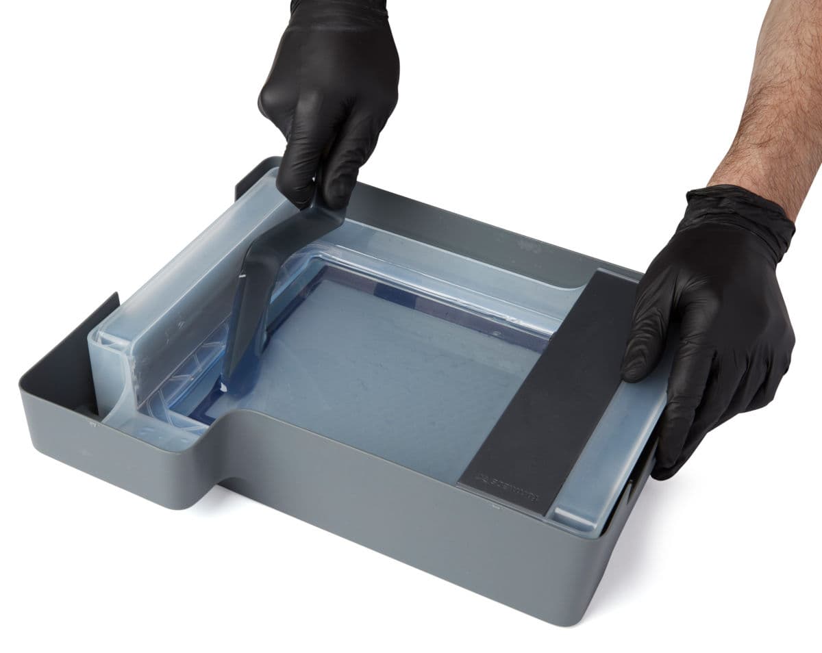 Scraping cured resin with the tank tool