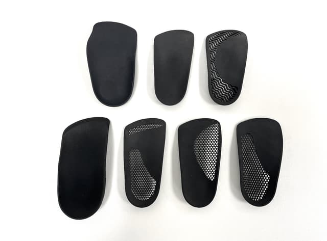 Seven 3D printed insoles