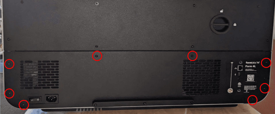 Remove the lower rear panel screws