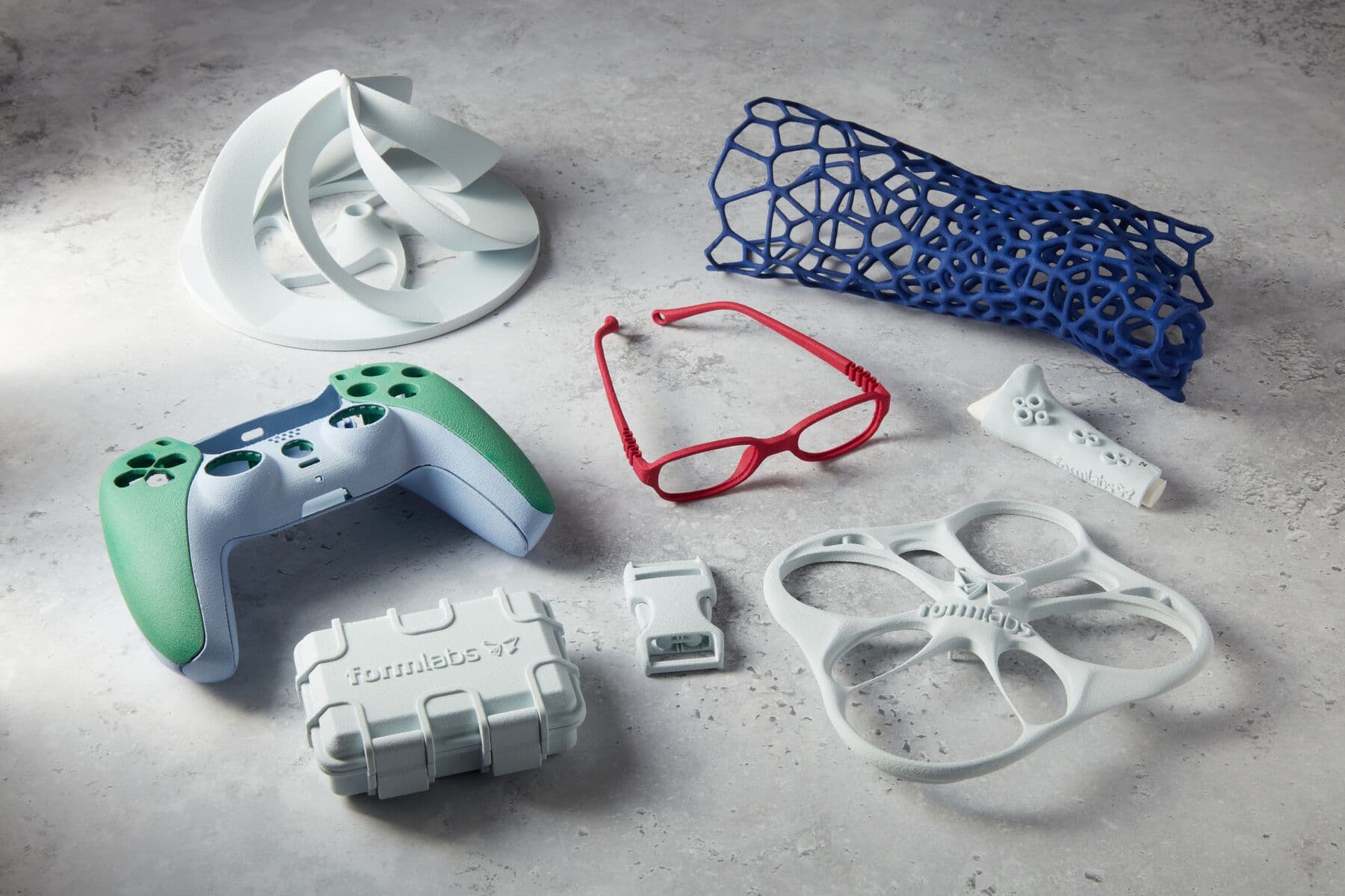 A collection of parts 3D printed in Nylon 12 White Powder