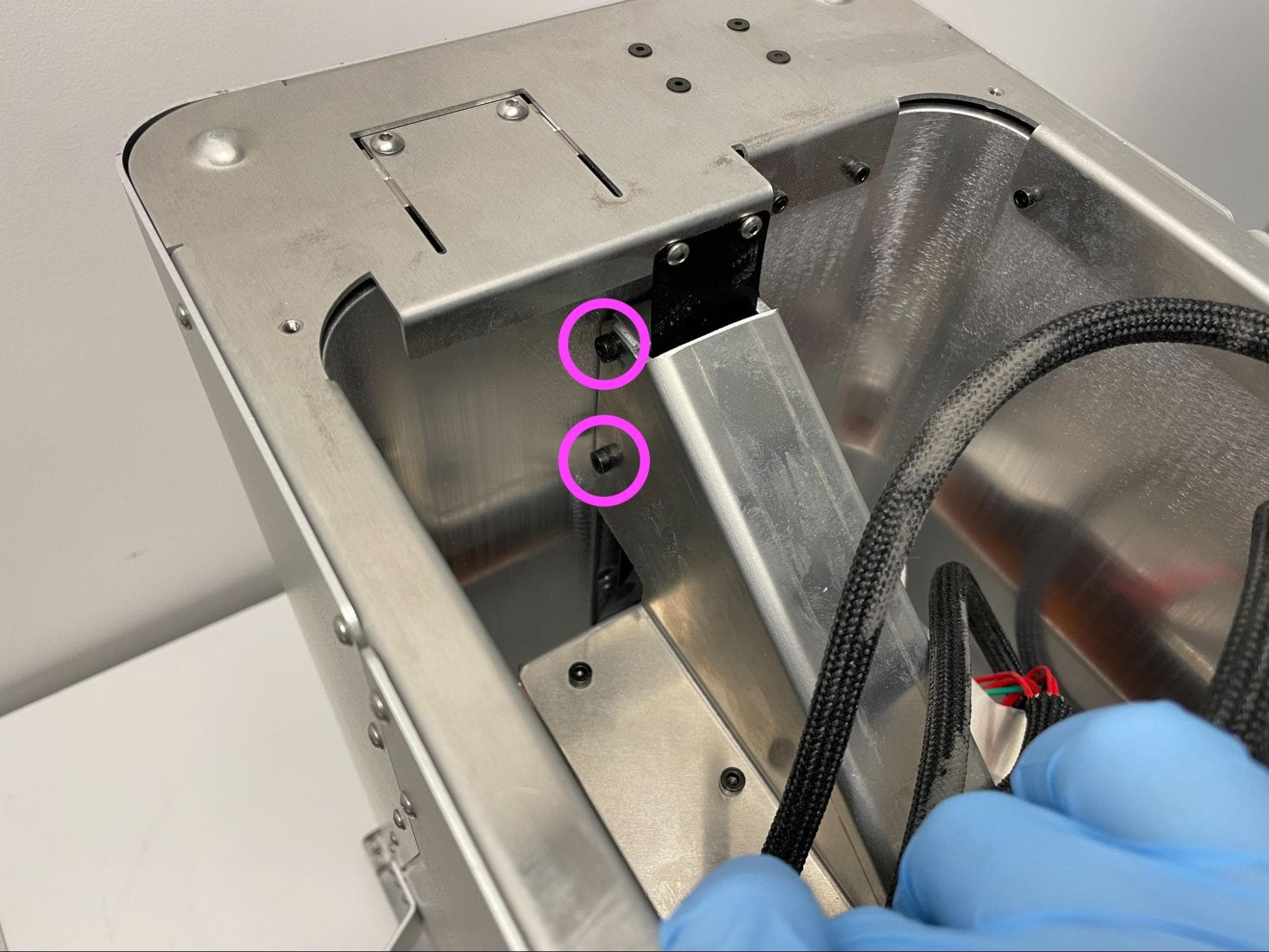 Check the piston arm bracket screws