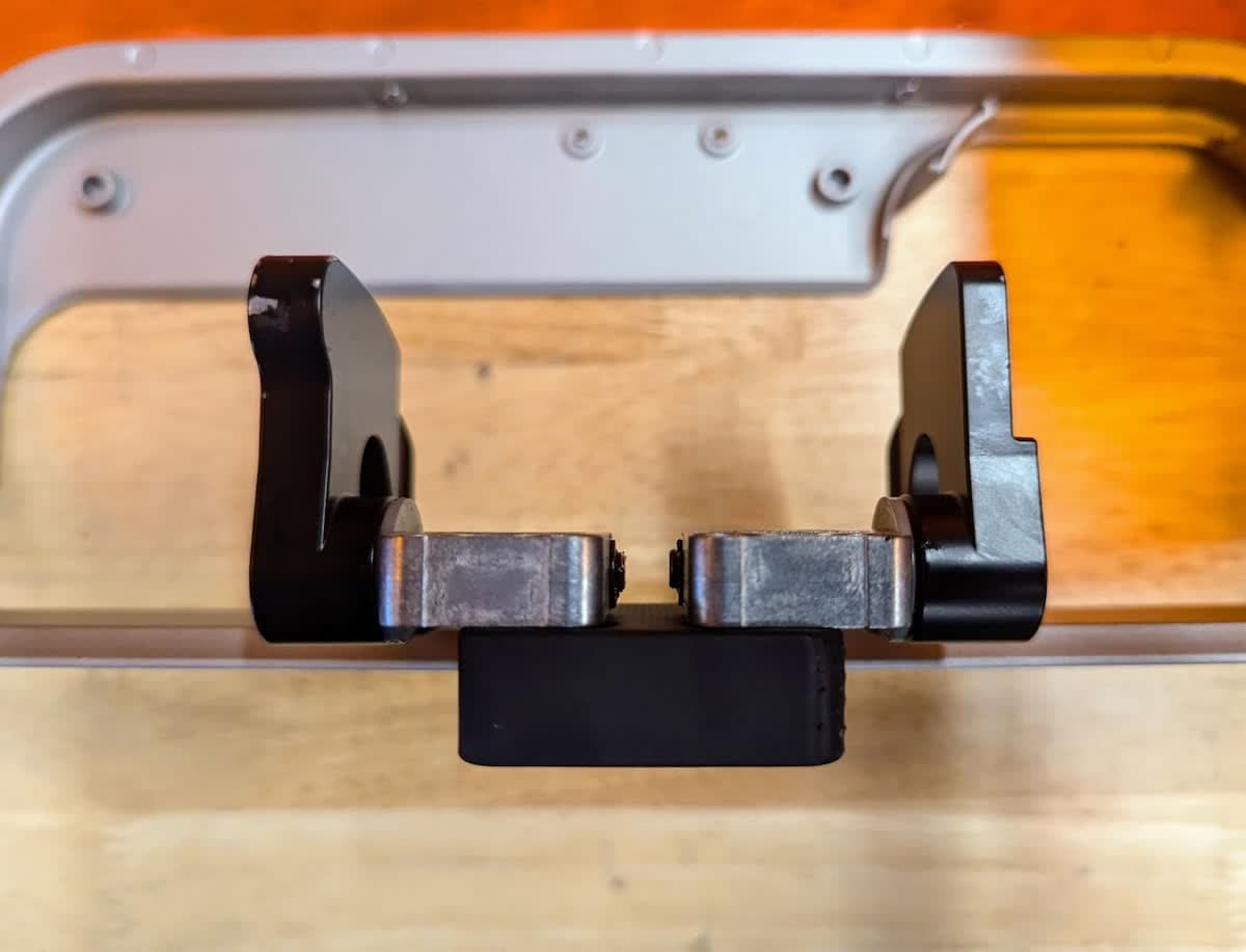 Form 4 cover hinges positioned flush with the cover tool
