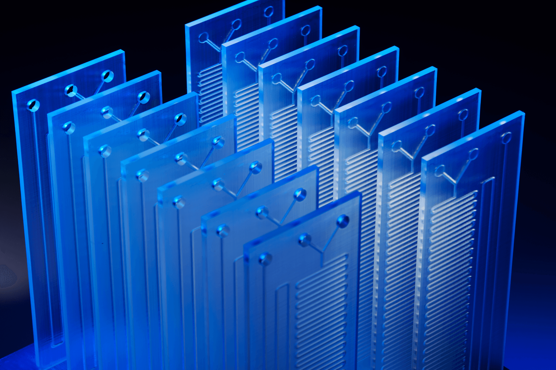 Close up on clear fluidic devices on build platform