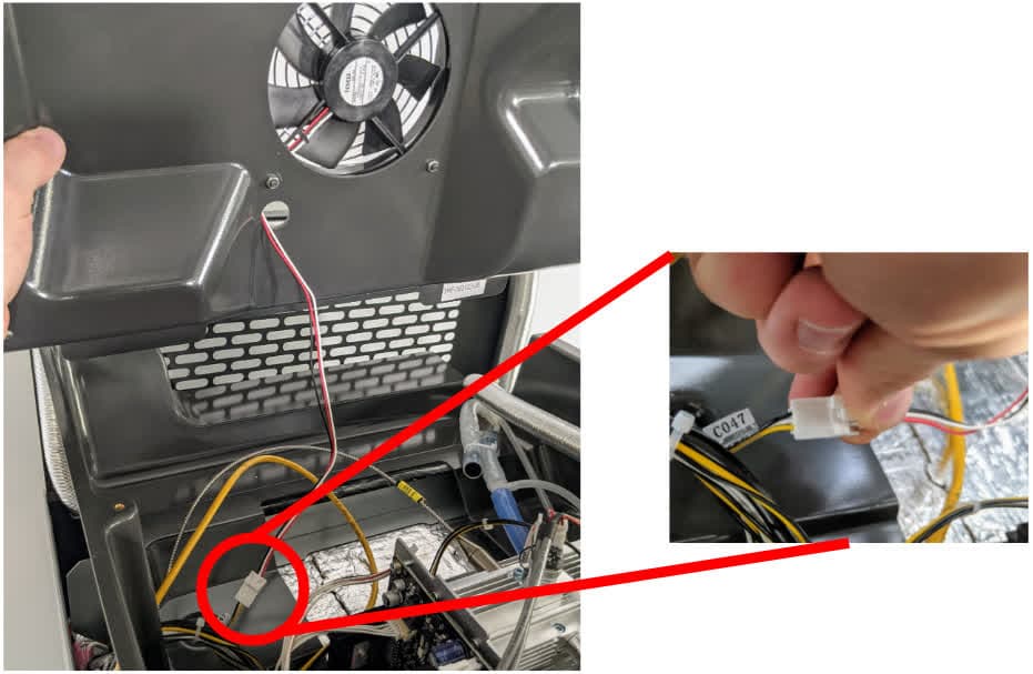 Step 2: Reconnect the fan cable to the upper cooling shroud