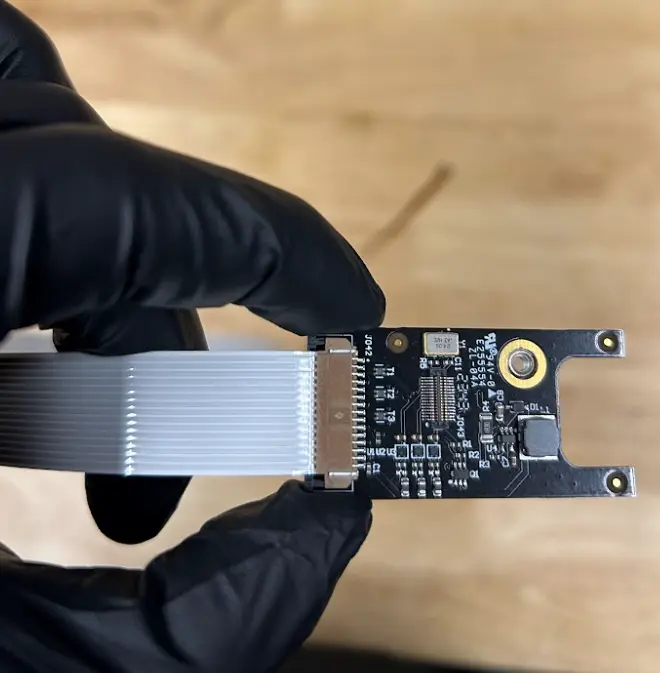 Insert the ribbon cable 3