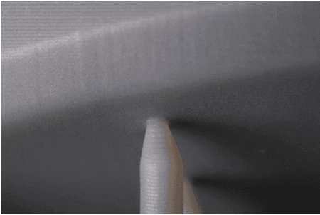 A close-up magnification shot of the touchpoint size on the Form 3, which is significantly more narrowe than the scaffolding.